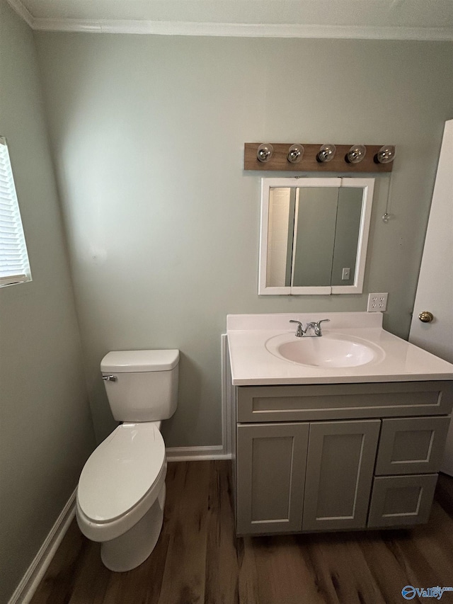 175 County Road 371, Centre, AL 35960 - half bath with wood finished floors, vanity, toilet, crown molding, and baseboards