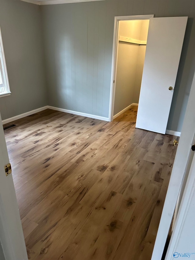 unfurnished bedroom with light hardwood / wood-style flooring