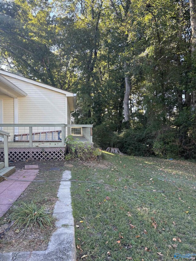 175 County Road 371, Centre, AL 35960 - view of green lawn with a deck