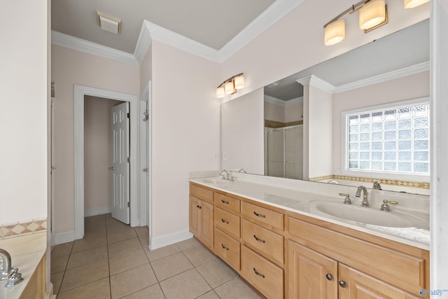 full bath with crown molding, a stall shower, a sink, and tile patterned floors