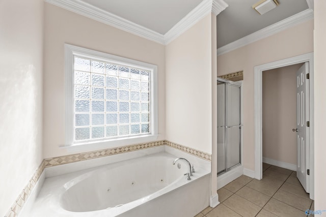 bathroom featuring ornamental molding, a shower stall, a whirlpool tub, and tile patterned floors