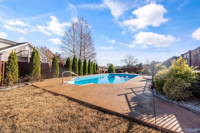 view of pool featuring a patio area, a fenced backyard, and a fenced in pool