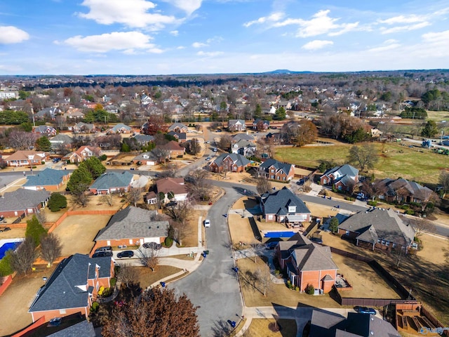 birds eye view of property with a residential view