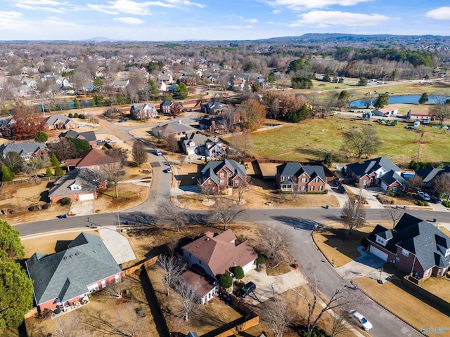 aerial view with a water view and a residential view