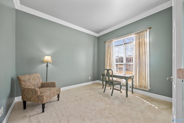 sitting room with crown molding, carpet, and baseboards