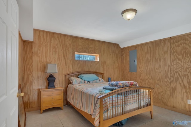 tiled bedroom with baseboards, electric panel, and wooden walls