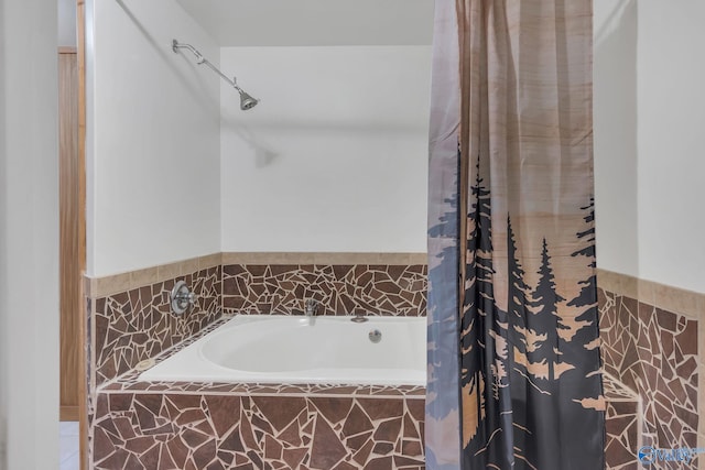 bathroom featuring a bath and a shower with curtain