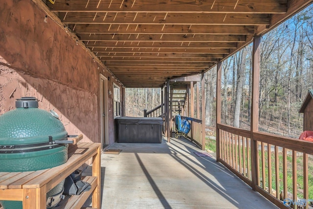 view of patio featuring a hot tub
