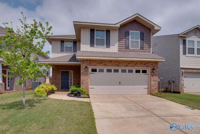 214 Tybee Dr, Madison, AL 35756 - view of front facade with an attached garage, concrete driveway, a front yard, and brick siding