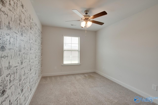 214 Tybee Dr, Madison, AL 35756 - carpeted empty room featuring a ceiling fan, baseboards, and visible vents