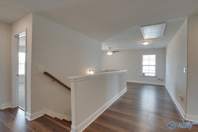 214 Tybee Dr, Madison, AL 35756 - hall featuring dark wood-type flooring, baseboards, and an upstairs landing