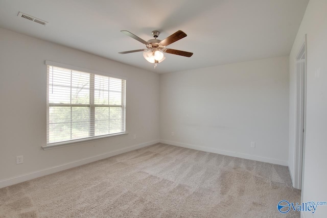214 Tybee Dr, Madison, AL 35756 - unfurnished room featuring baseboards, ceiling fan, light colored carpet, and visible vents