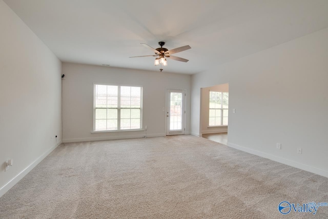214 Tybee Dr, Madison, AL 35756 - empty room with carpet floors, a ceiling fan, and baseboards