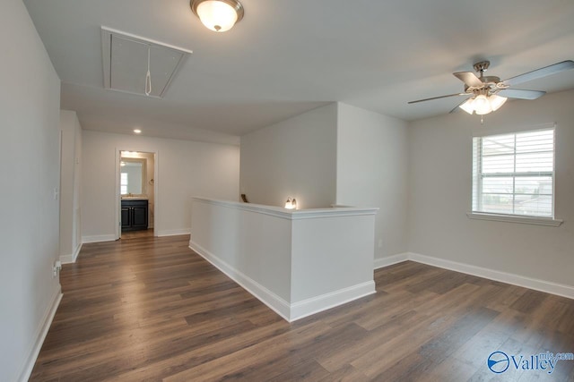 214 Tybee Dr, Madison, AL 35756 - corridor featuring baseboards, attic access, and dark wood-style floors