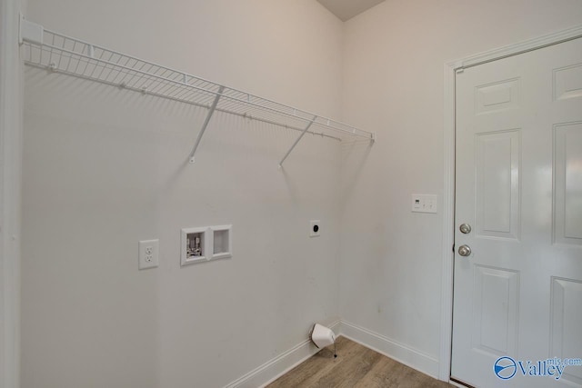 214 Tybee Dr, Madison, AL 35756 - laundry room with laundry area, baseboards, light wood-style floors, washer hookup, and hookup for an electric dryer
