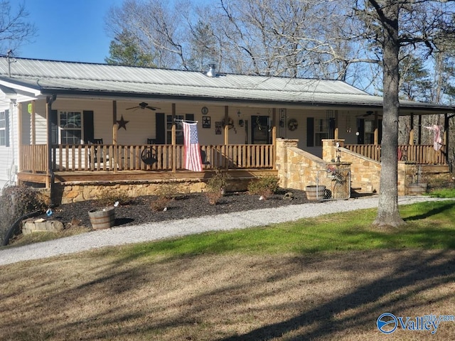 view of front of home with ceiling fan and covered porch