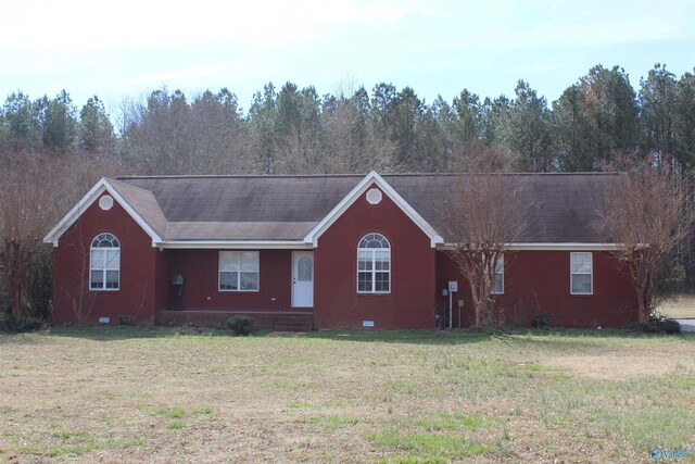 single story home with a front yard, crawl space, and brick siding