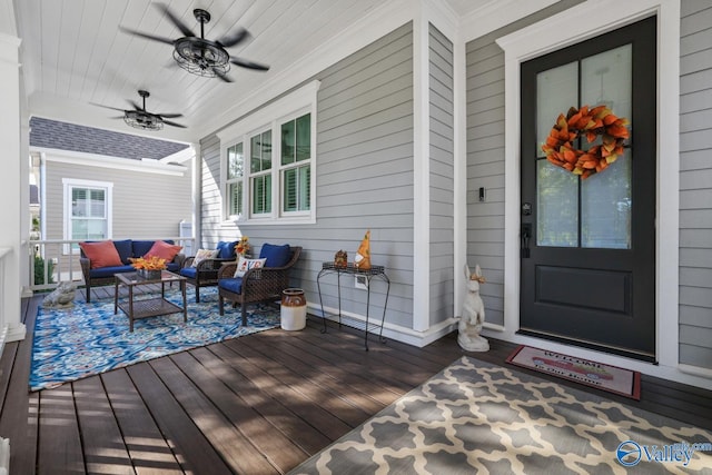 wooden deck with outdoor lounge area, ceiling fan, and a porch