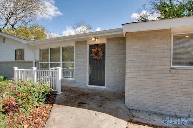 property entrance with a porch