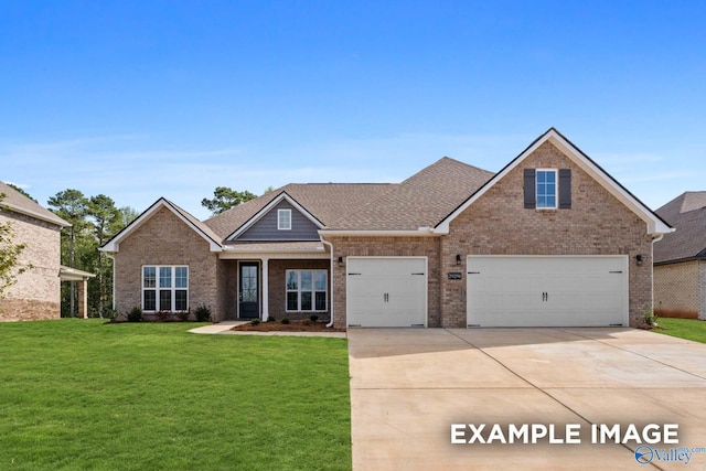 view of front of home with brick siding, a shingled roof, concrete driveway, and a front yard