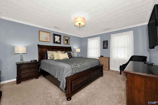 bedroom featuring a textured ceiling, ornamental molding, and light carpet