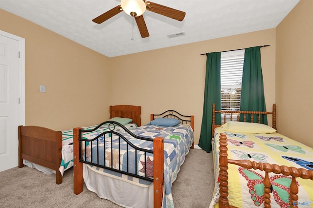 bedroom featuring carpet flooring and ceiling fan