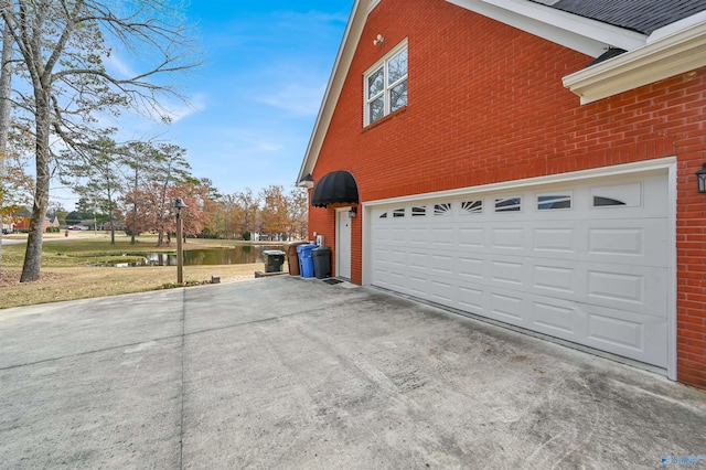 garage featuring a water view