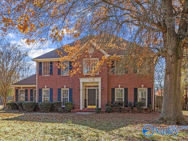 colonial house with a front lawn