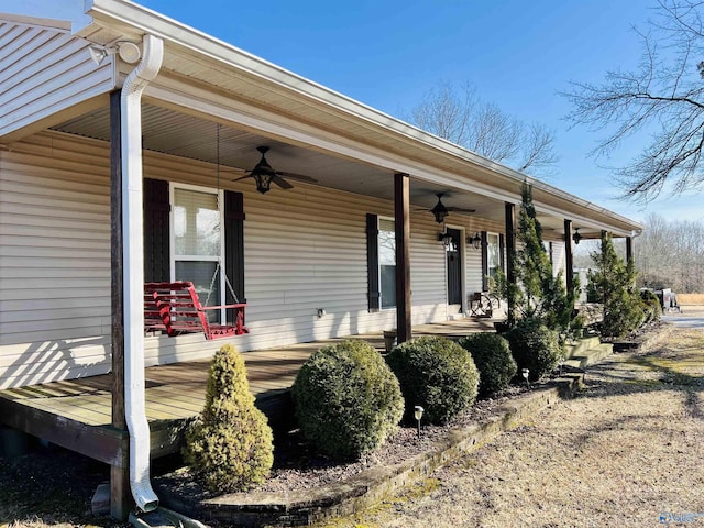 exterior space featuring ceiling fan and a porch