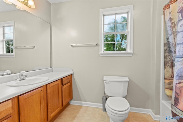 full bathroom with vanity, tile patterned flooring, shower / bath combination with curtain, and toilet