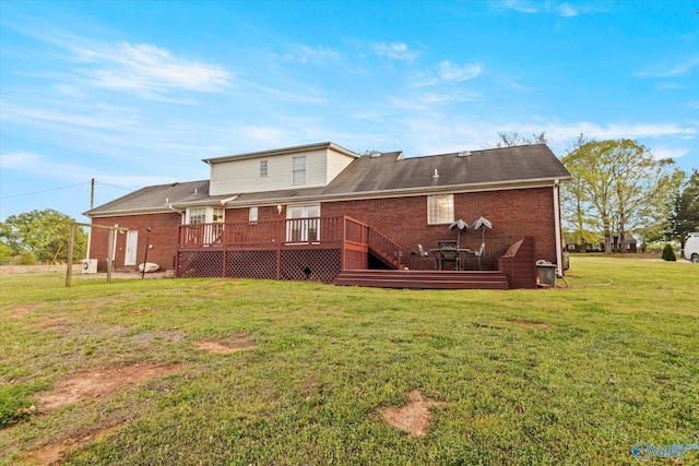 back of house with a wooden deck and a yard