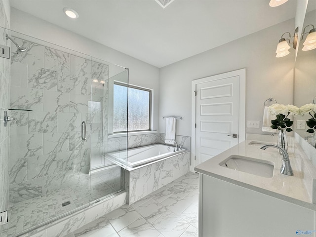 bathroom with a garden tub, marble finish floor, a sink, a marble finish shower, and double vanity