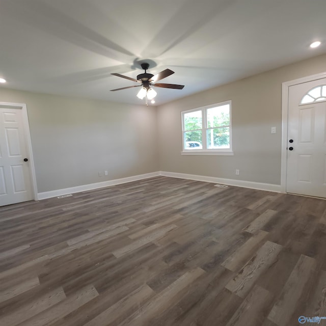 foyer entrance featuring ceiling fan and dark hardwood / wood-style flooring