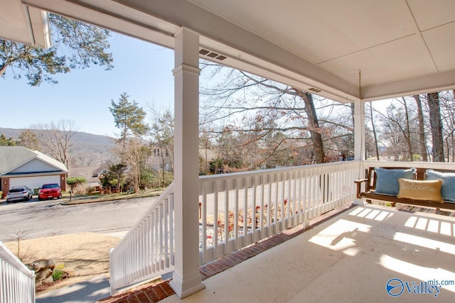 view of patio / terrace with a mountain view