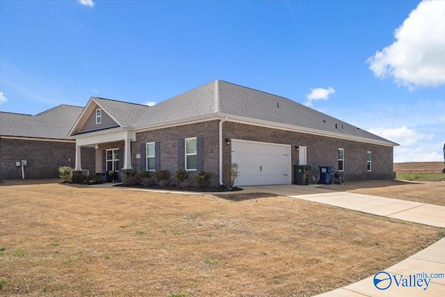 view of home's exterior with a lawn and a garage