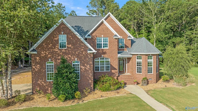 view of front of home featuring a front lawn