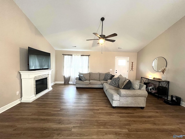 122 Taylor Ridge Rd, Leesburg, AL 35983 - living room with lofted ceiling, a ceiling fan, a glass covered fireplace, and dark wood finished floors