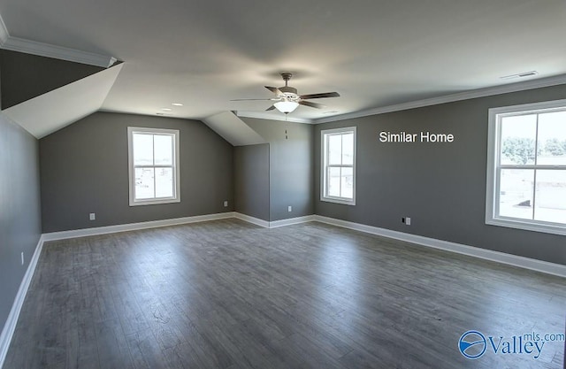 bonus room featuring visible vents, baseboards, ceiling fan, lofted ceiling, and dark wood-style floors