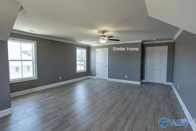 interior space featuring baseboards, crown molding, ceiling fan, and dark wood-style flooring