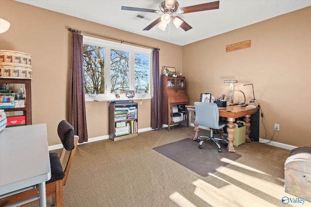 office space featuring carpet floors and ceiling fan