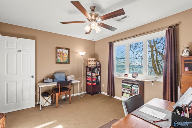 office space featuring carpet floors and ceiling fan