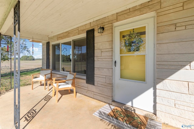 doorway to property with a porch