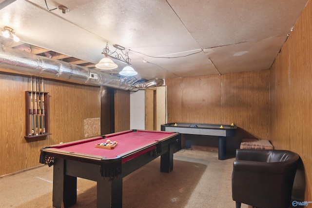 playroom featuring pool table and wood walls