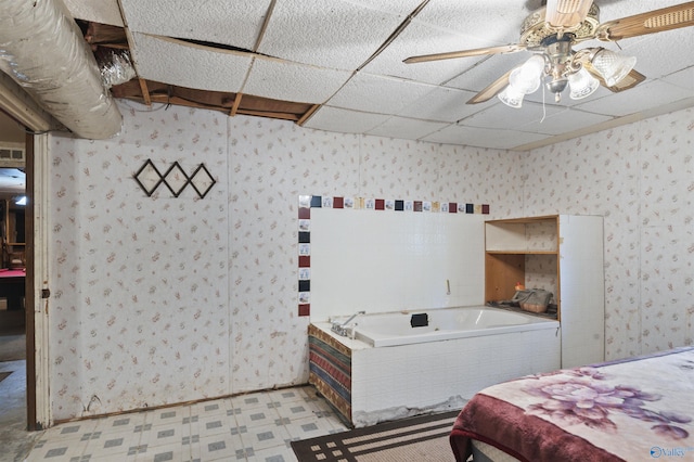 bedroom featuring a paneled ceiling