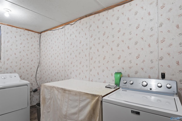 laundry room with washer and clothes dryer