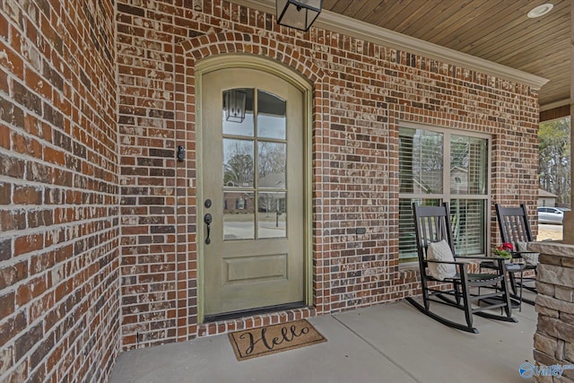 property entrance featuring a porch