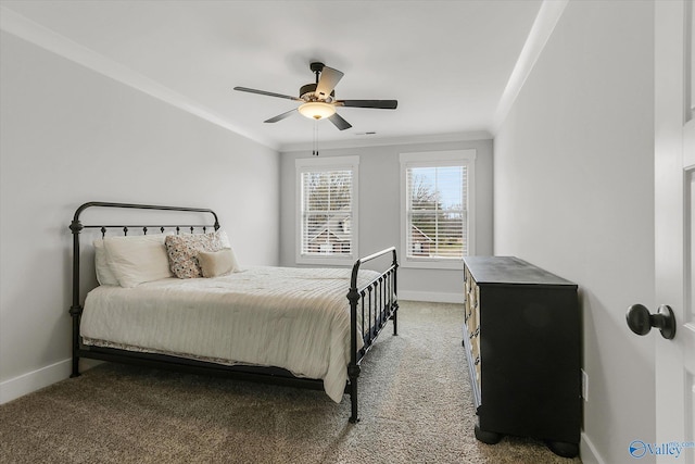 bedroom featuring crown molding, ceiling fan, and carpet flooring