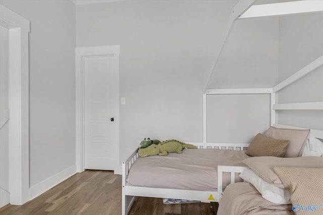 bedroom featuring hardwood / wood-style floors