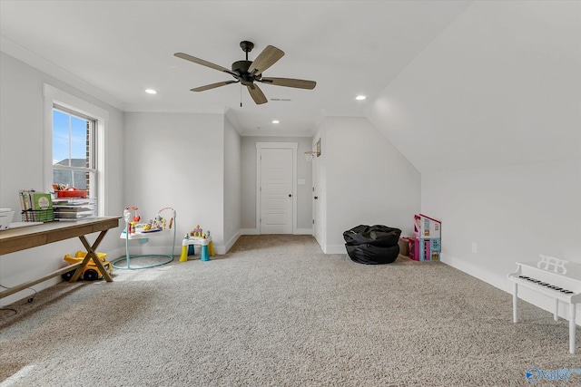 playroom with carpet, lofted ceiling, and ceiling fan