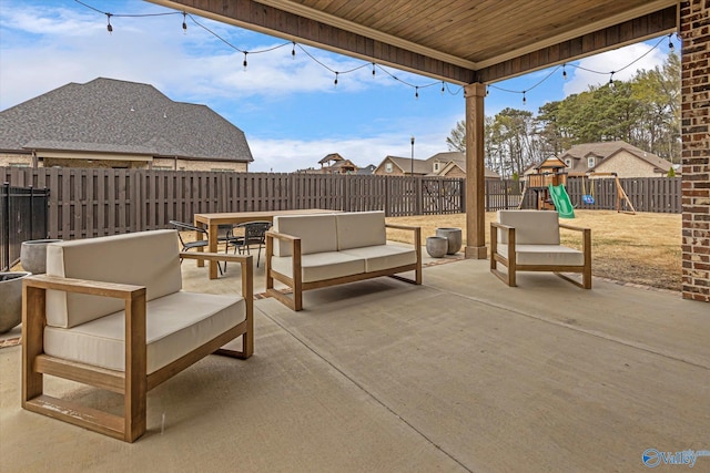 view of patio with a playground and an outdoor living space